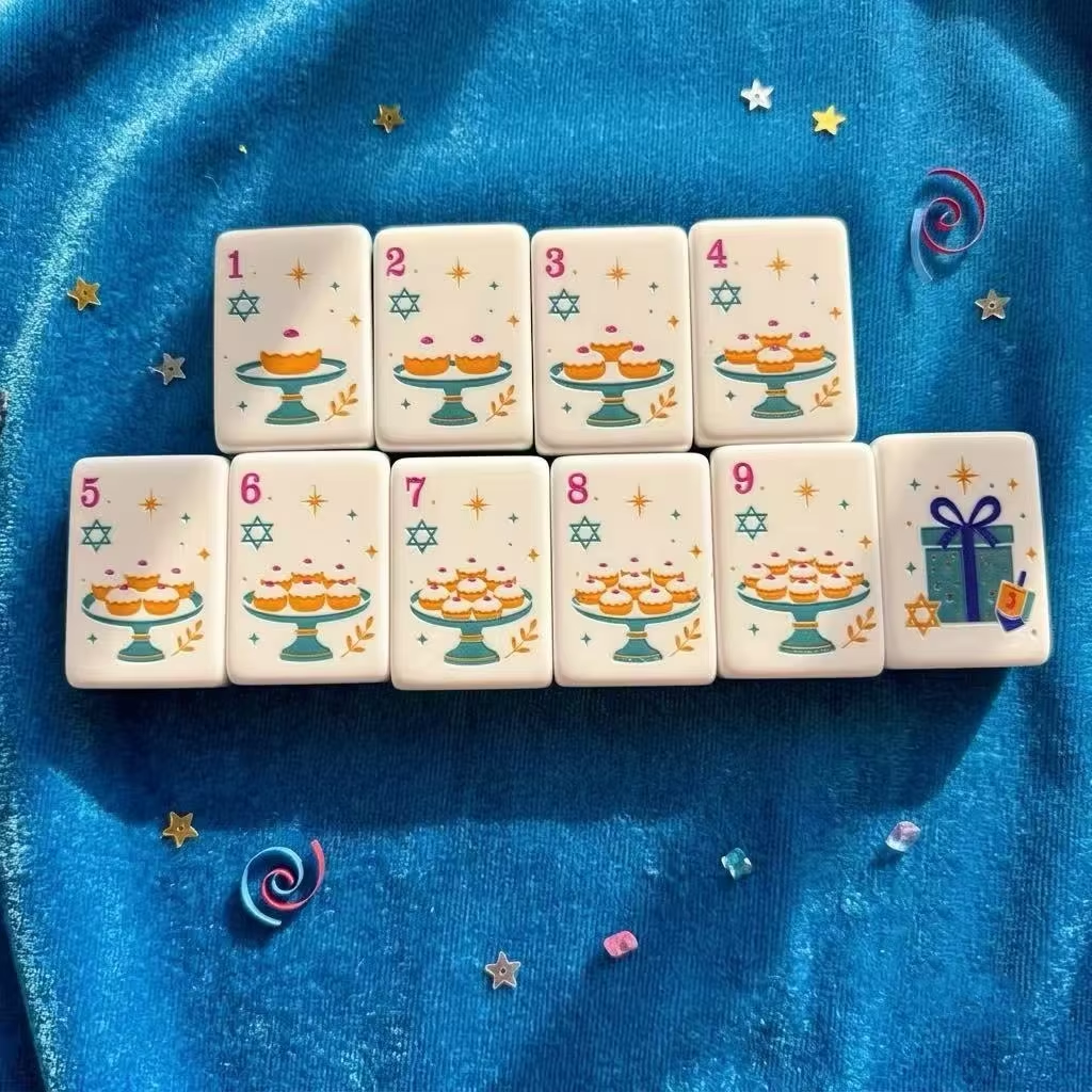 Festival of Lights mahjong tiles on blue fabric
