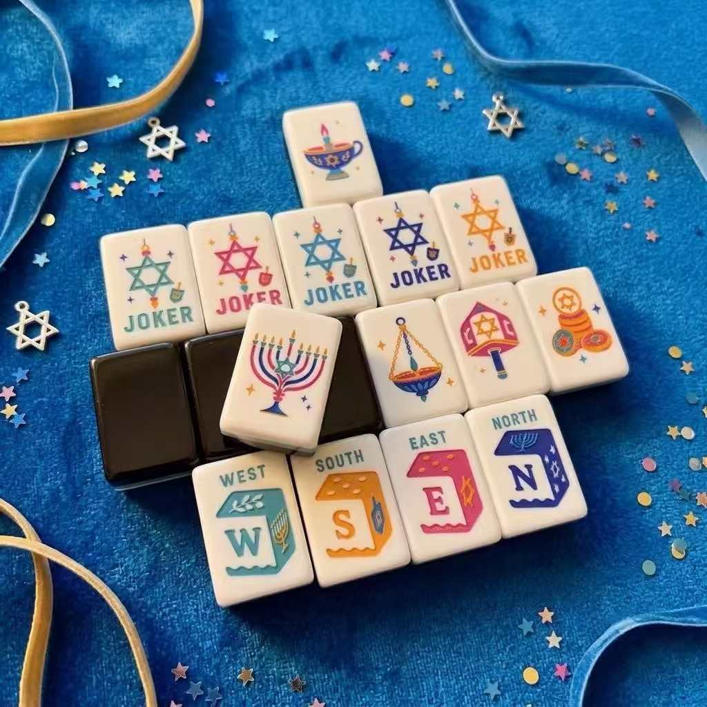 Festival of Lights mahjong tiles on blue fabric